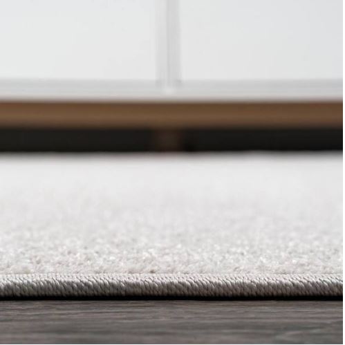 Haze Solid Low-Pile Ivory 5 ft. Round Area Rug