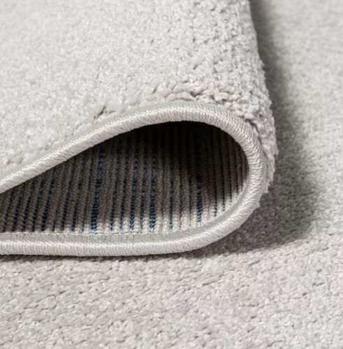 Haze Solid Low-Pile Ivory 5 ft. Round Area Rug