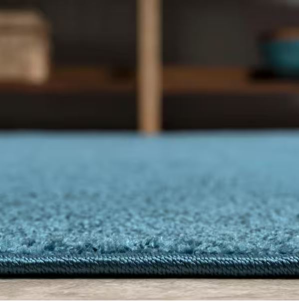 5 ft. x 8 ft. Haze Solid Turquoise Low-Pile Area Rug