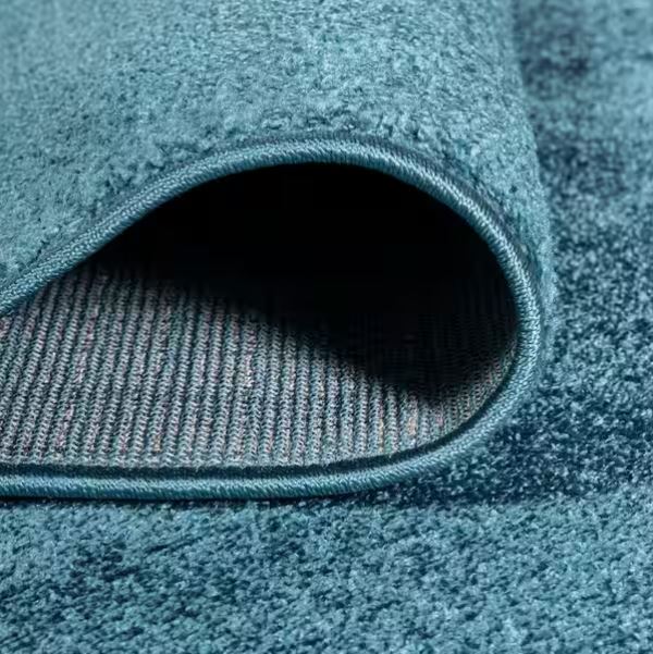 5 ft. x 8 ft. Haze Solid Turquoise Low-Pile Area Rug