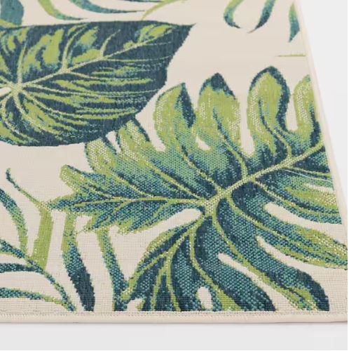 Shop Labor Day Sale ❯ Backyard Bungalow Ivory/Multi 7 ft. 7 in. x 10 ft. Green Leaf Tropics Polypropylene Indoor/Outdoor Area Rug