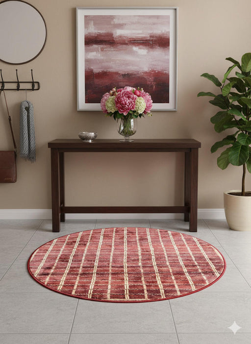 4' Round Muted Rose Warm Beige Striped Textured Area Rug placed in an entryway with a dark wood console table, floral arrangement, and neutral wall décor.