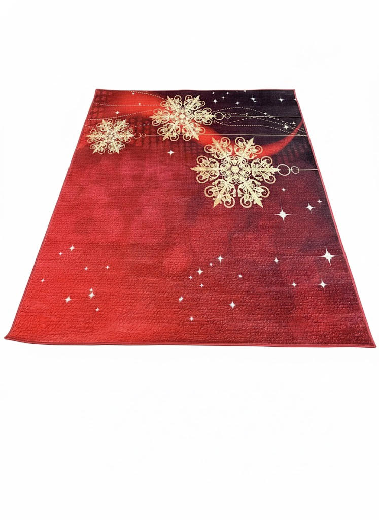 Rectangular holiday area rug featuring a red gradient background with elegant gold and ivory snowflake designs and subtle star accents, perfect for seasonal décor.
