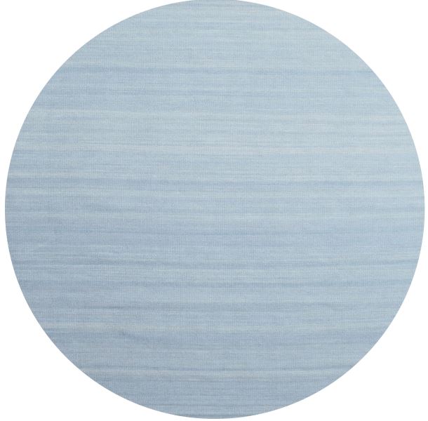 Round rug featuring a solid denim blue surface with subtle horizontal texture for a clean modern look.